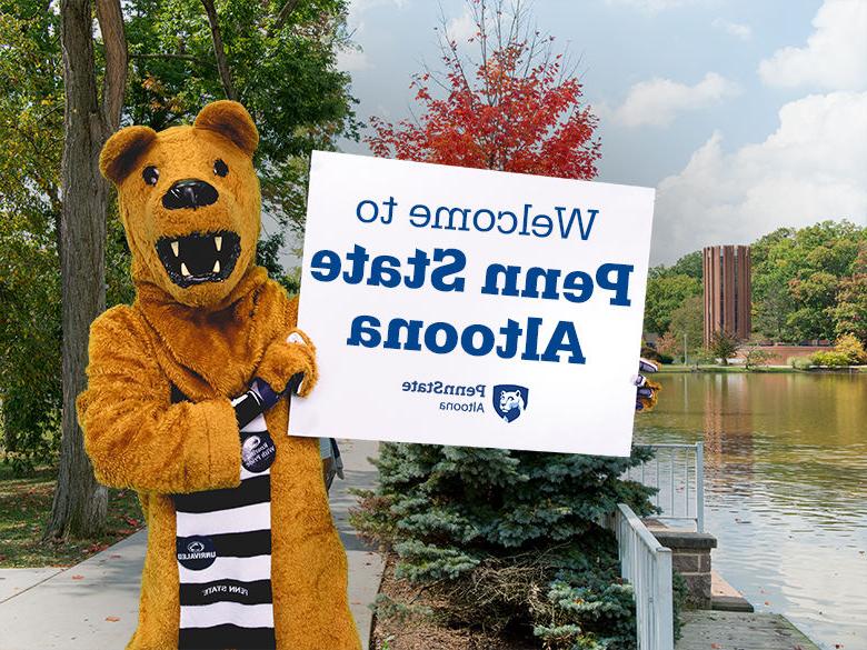 The Nittany Lion mascot holding up a sign reading Welcome to <a href='http://8taqj.goudounet.com'>十大网投平台信誉排行榜</a>阿尔图纳分校
